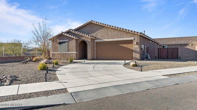 view of front of property featuring a garage