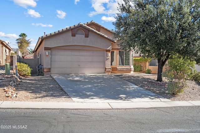 view of front of property featuring a garage