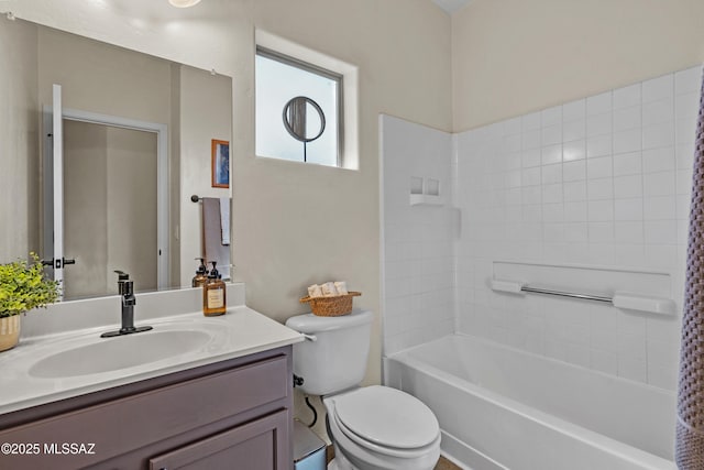 full bathroom with vanity, shower / bathing tub combination, and toilet