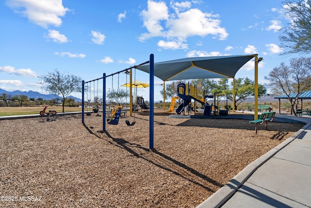 view of play area featuring a mountain view