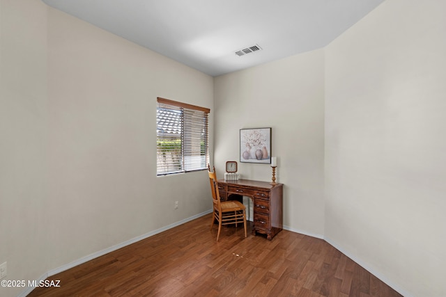 office area with hardwood / wood-style floors