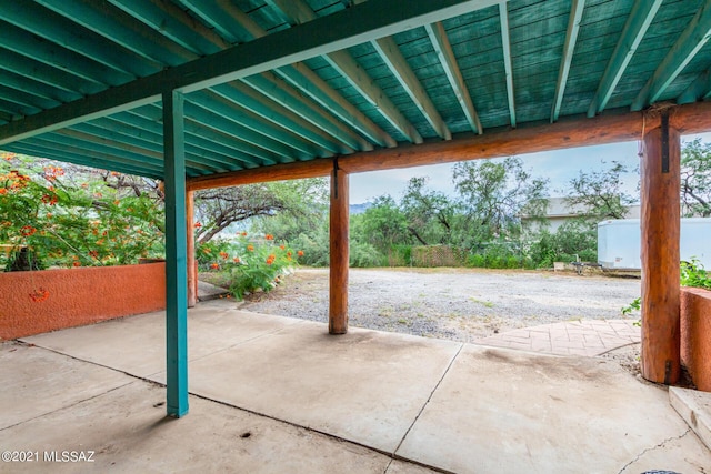 view of patio / terrace featuring a shed