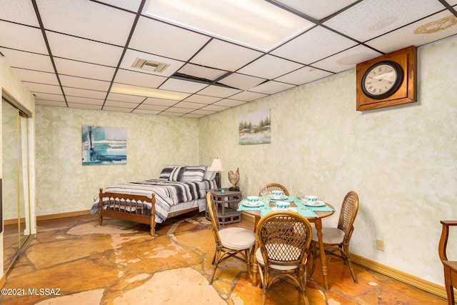 bedroom with a drop ceiling