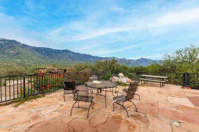 view of patio / terrace with a mountain view