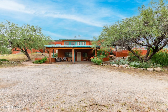 view of front of home featuring a patio area