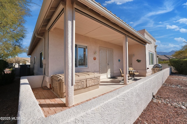 view of front of home with a patio