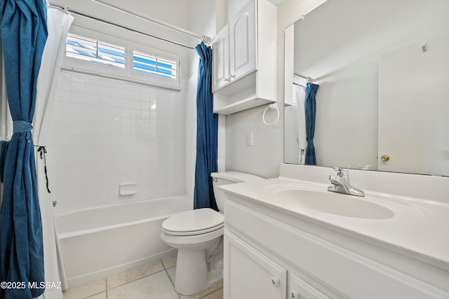 full bathroom featuring tile patterned floors, vanity, toilet, and shower / bath combination with curtain