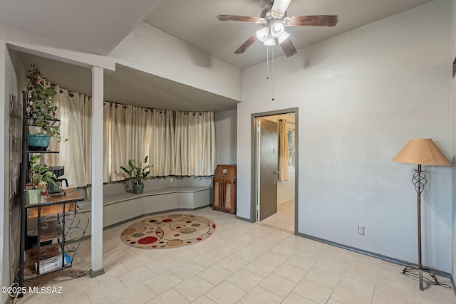 interior space featuring a ceiling fan