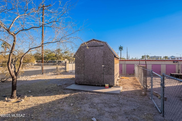 view of shed featuring a fenced backyard