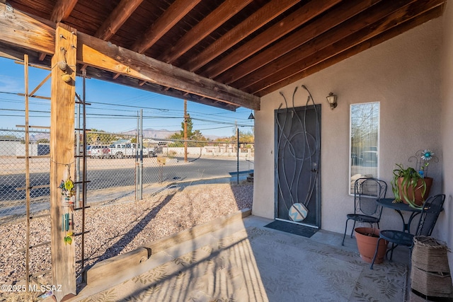 view of yard featuring fence and a patio