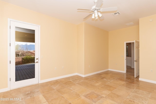 unfurnished room featuring ceiling fan