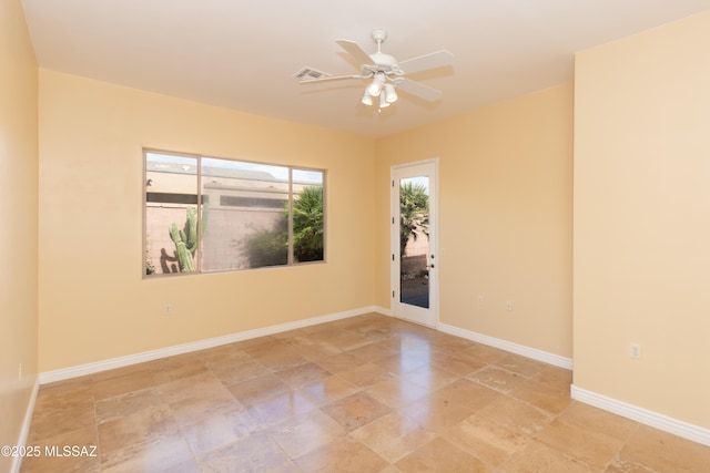 empty room featuring ceiling fan