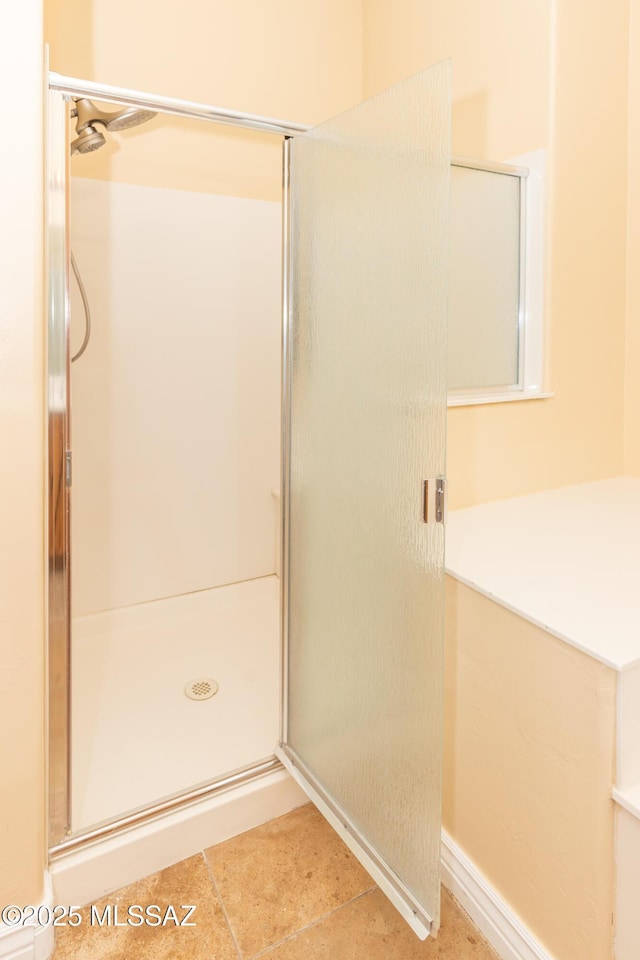 bathroom featuring an enclosed shower