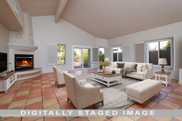 tiled living room with a large fireplace, high vaulted ceiling, and beam ceiling