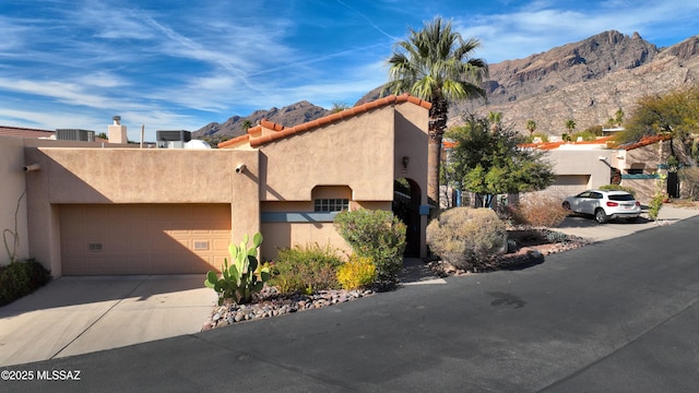 view of front of house with a mountain view