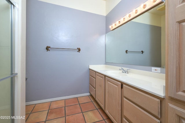 bathroom featuring vanity and tile patterned flooring