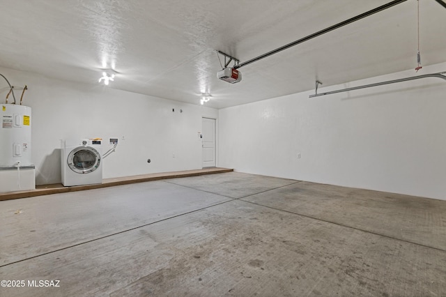 garage featuring water heater, a garage door opener, and washer / dryer