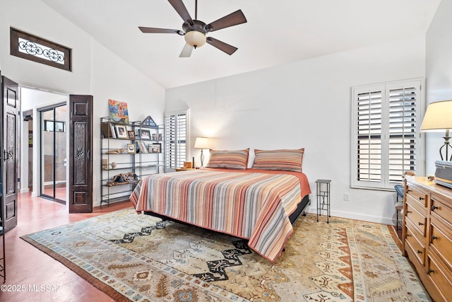 bedroom with ceiling fan and lofted ceiling