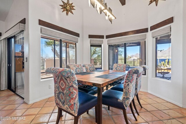 tiled dining area with a healthy amount of sunlight