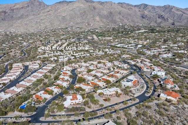 bird's eye view with a mountain view