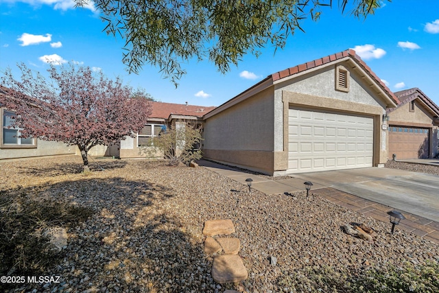 view of front of property with a garage