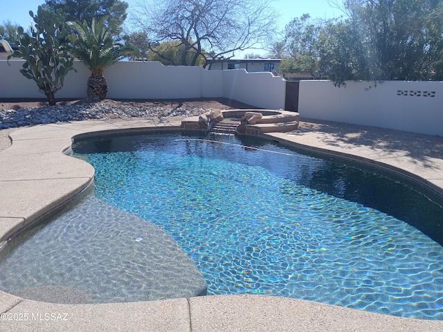 view of swimming pool with a fenced in pool and a fenced backyard