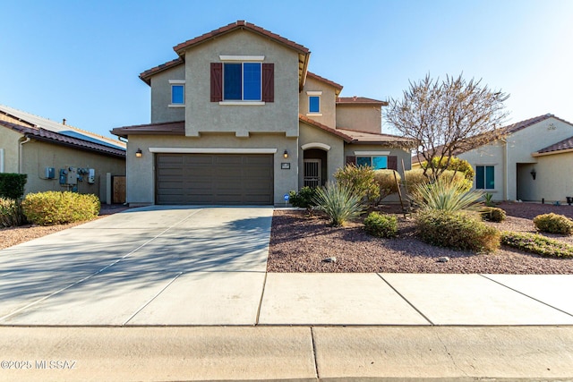 front of property featuring a garage