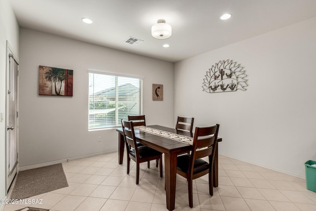 dining room featuring light tile patterned flooring