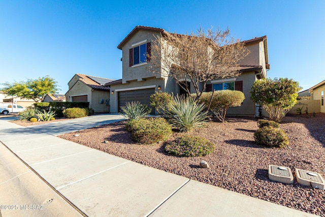 view of property featuring a garage