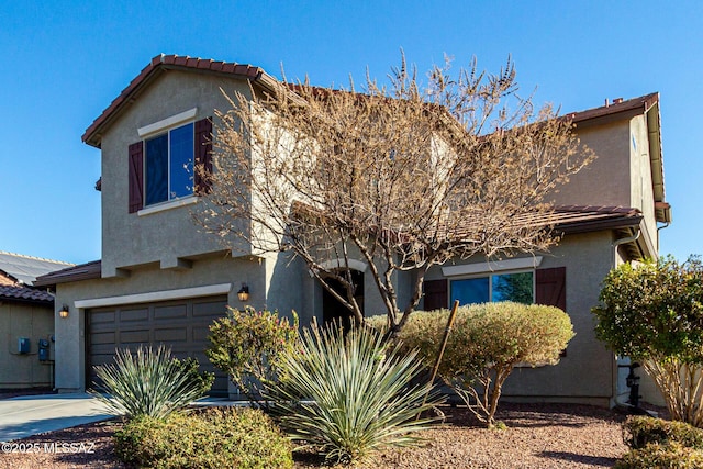 view of front property with a garage