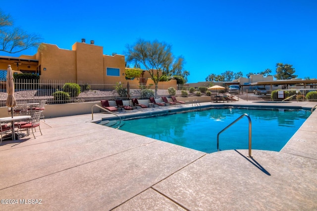 view of pool with a patio area