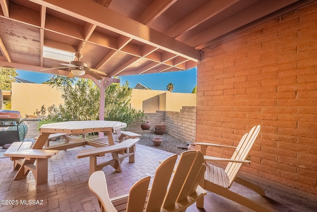 view of patio / terrace with a grill and ceiling fan