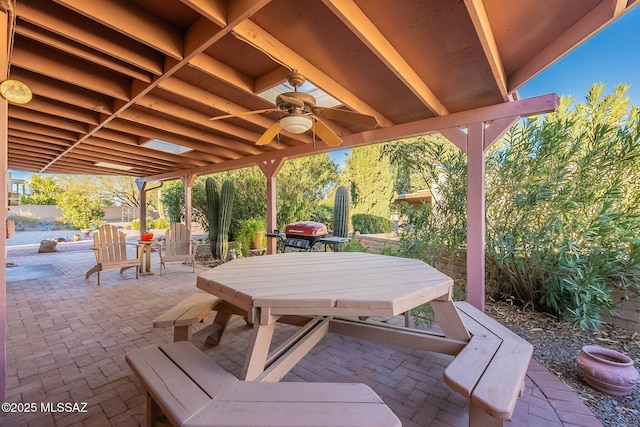 view of patio featuring a grill and ceiling fan