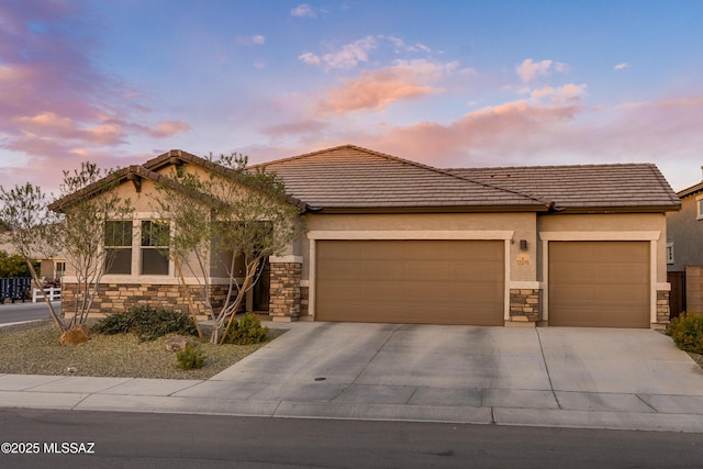 view of front of home with a garage