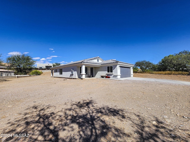 view of front of property featuring a garage