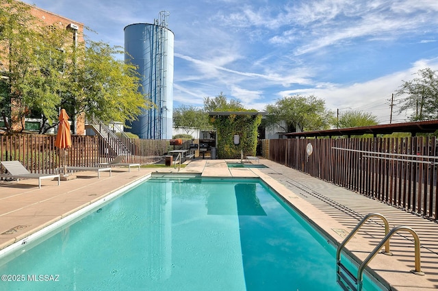 view of pool featuring a patio