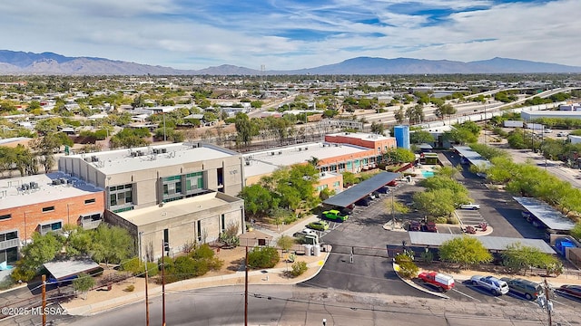 birds eye view of property with a mountain view