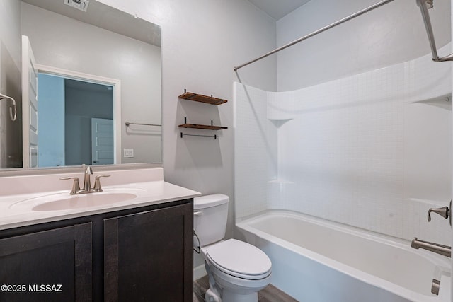 full bathroom with toilet, tub / shower combination, and vanity