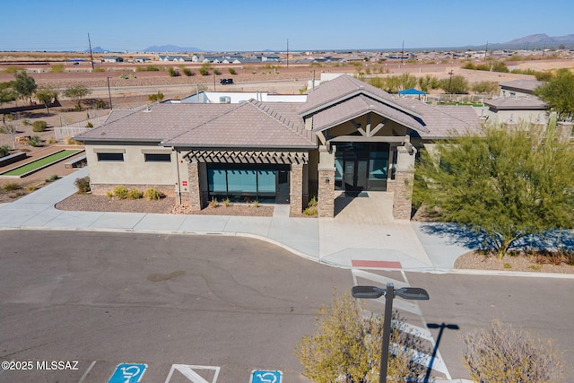 view of front of house featuring a mountain view