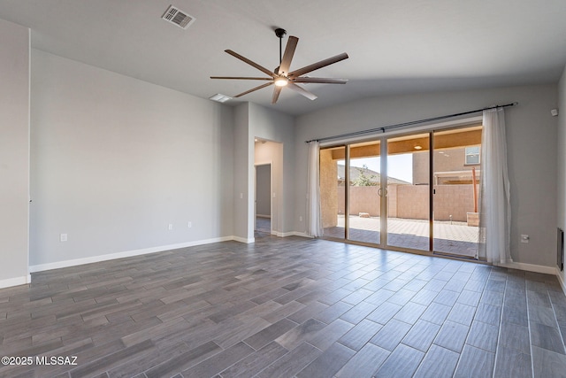 unfurnished room with ceiling fan and vaulted ceiling