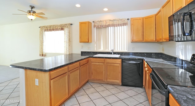 kitchen with ceiling fan, sink, kitchen peninsula, light tile patterned floors, and black appliances