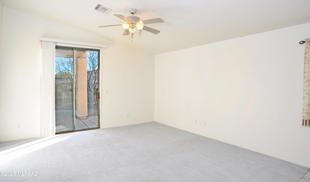 unfurnished room with light colored carpet, ceiling fan, and lofted ceiling