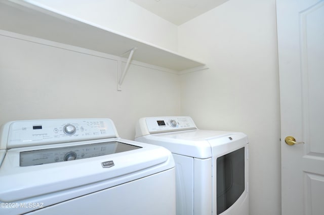 laundry room with washer and dryer