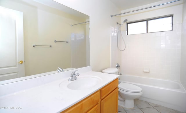 full bathroom with tile patterned floors, vanity, toilet, and tiled shower / bath combo