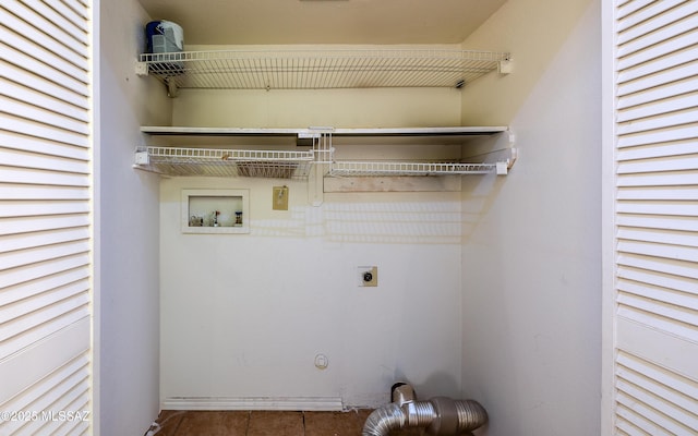 laundry area with electric dryer hookup, tile patterned floors, hookup for a gas dryer, laundry area, and hookup for a washing machine