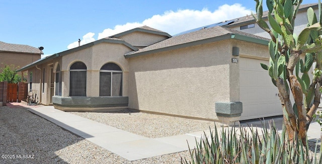 view of property exterior featuring a garage