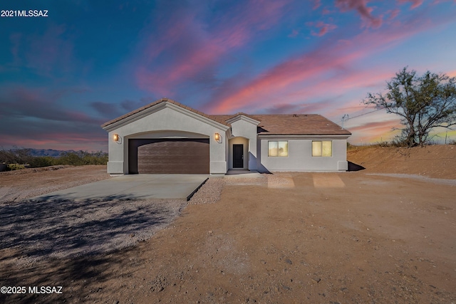 view of front of home with a garage