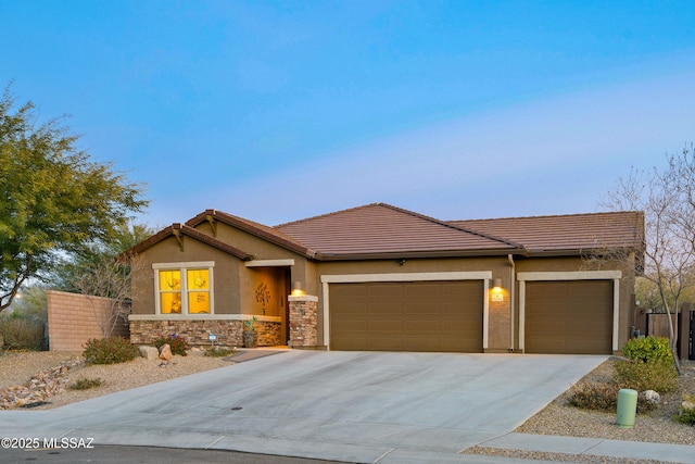 view of front of home with a garage