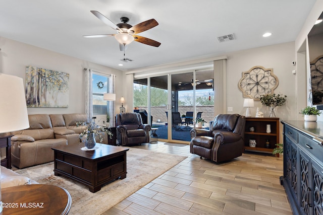 living room with ceiling fan