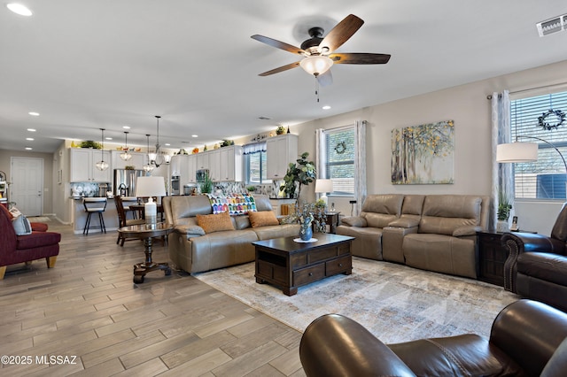 living room with ceiling fan